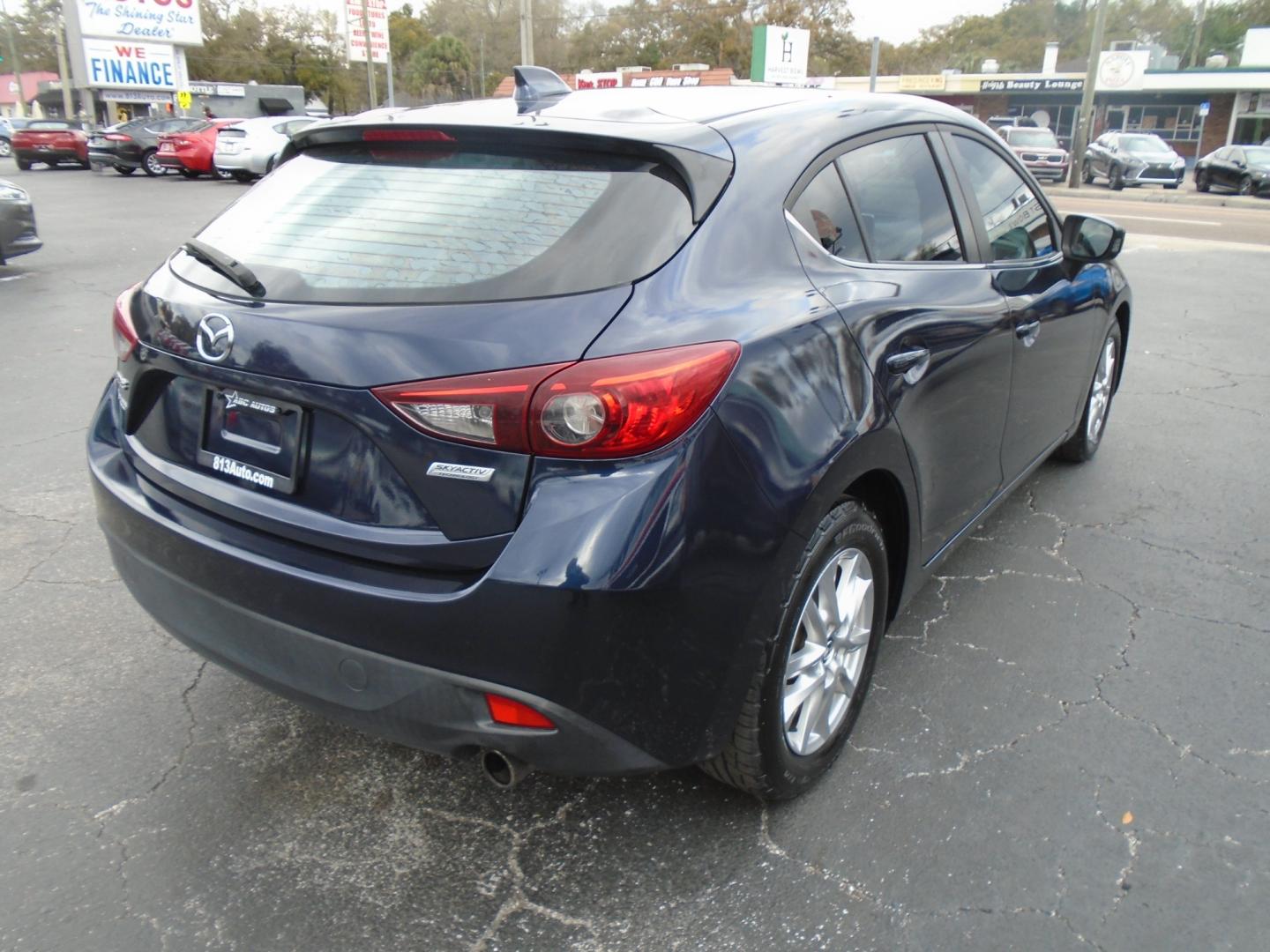 2014 Mazda MAZDA3 (JM1BM1M73E1) , located at 6112 N Florida Avenue, Tampa, FL, 33604, (888) 521-5131, 27.954929, -82.459534 - Photo#3